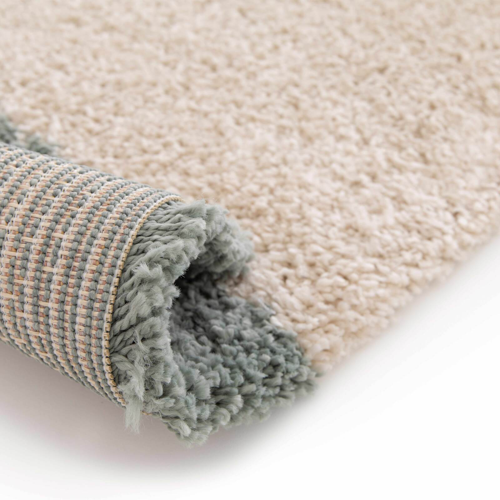 Tappeto rettangolare con motivo geometrico a pelo lungo Tappeto rettangolare con motivo geometrico a pelo lungo