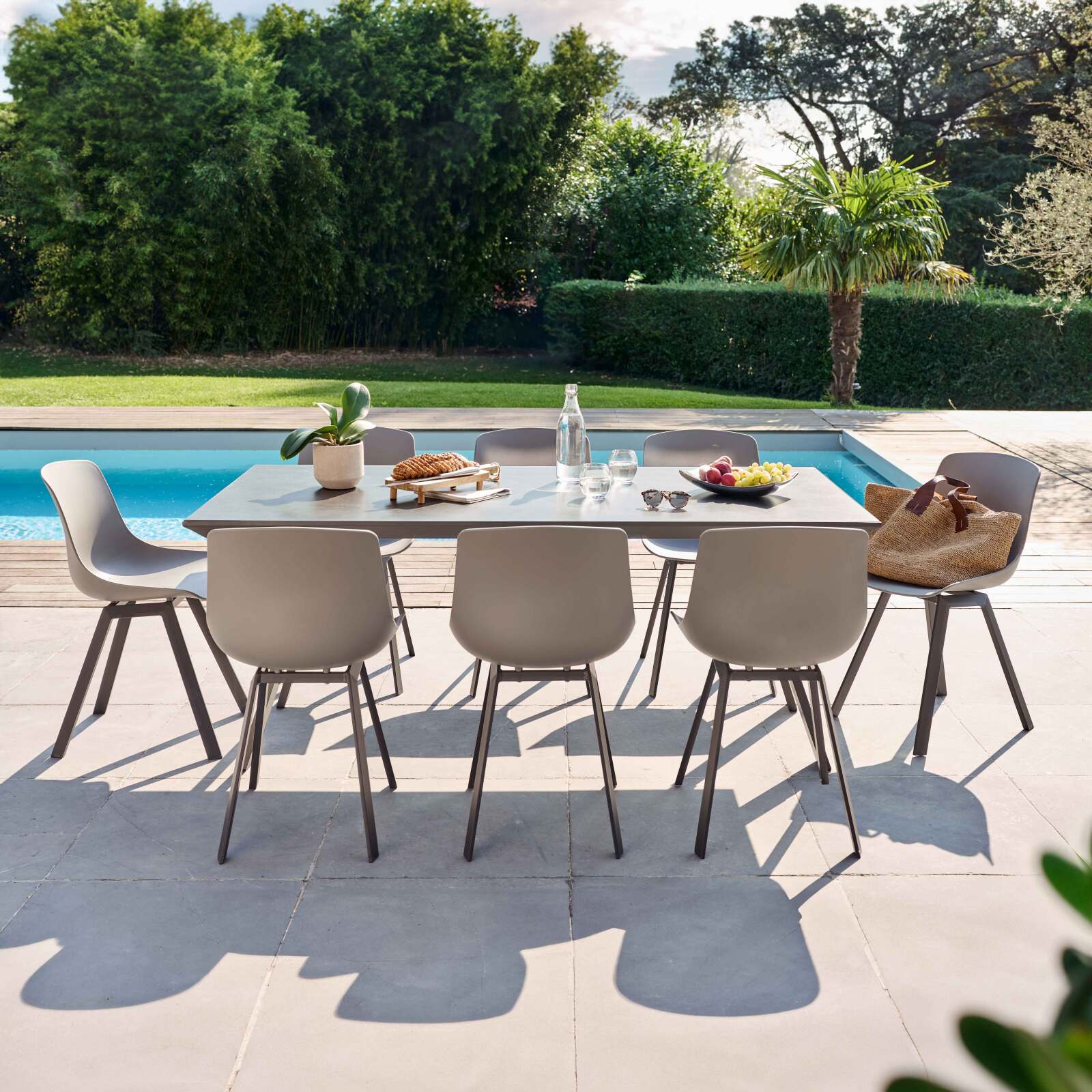 Tavolo da giardino rettangolare 180 x 90 cm in alluminio e pietra sinterizzata con 8 sedie