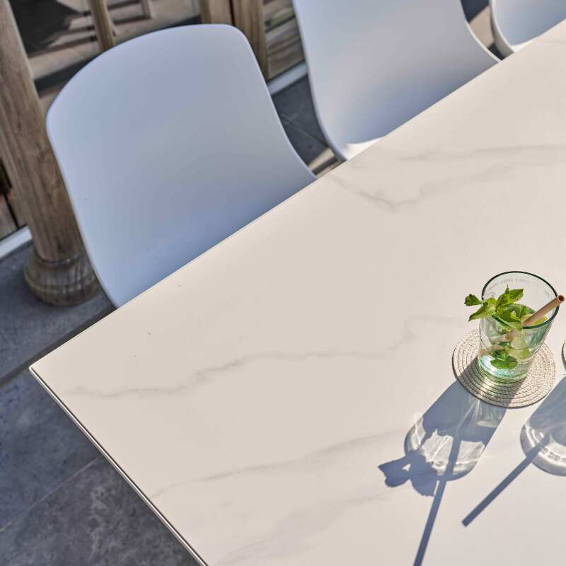 Tavolo da giardino rettangolare 180 x 90 cm in alluminio e pietra sinterizzata con 8 sedie