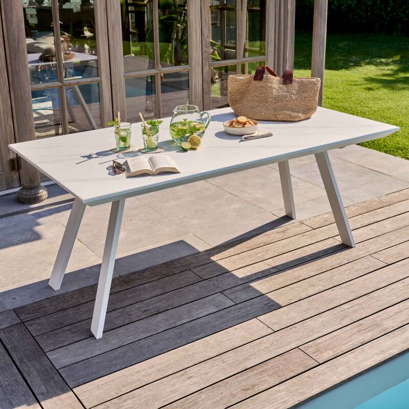 Tavolo da giardino rettangolare 180 x 90 cm in alluminio e pietra sinterizzata con 8 sedie