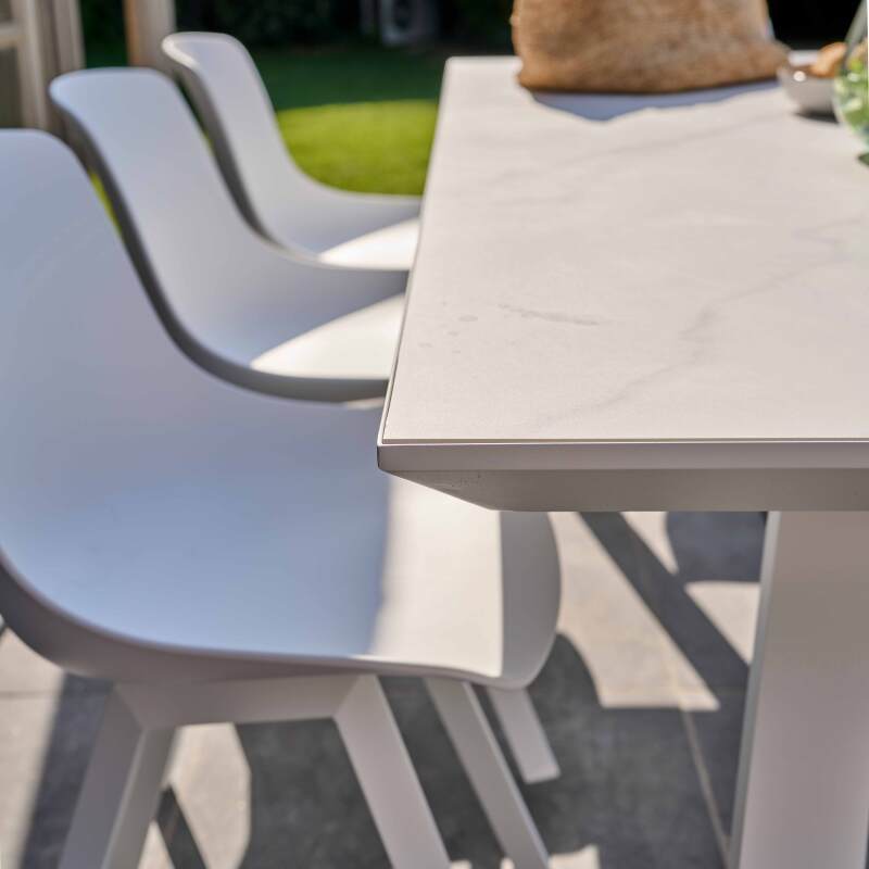Tavolo da giardino rettangolare 180 x 90 cm in alluminio e pietra sinterizzata con 8 sedie