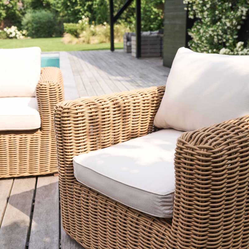 Salotto da giardino basso a 7 posti in resina intrecciata