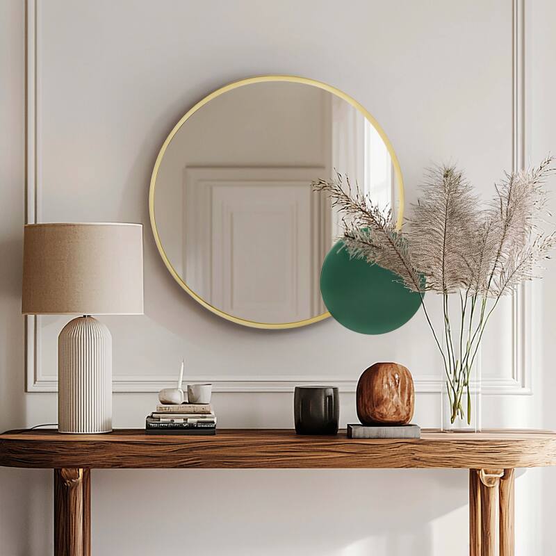 Specchio con dettaglio in metallo smaltato