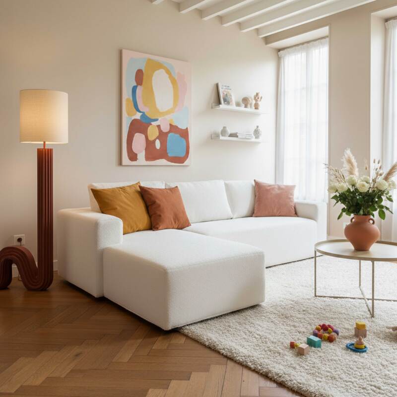 Divano angolare 4 posti in tessuto bouclé a coste con chaise longue sinistra e cuscini