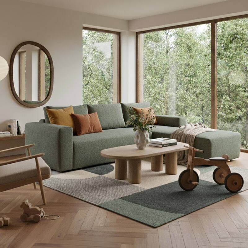 Divano angolare 4 posti in tessuto bouclé con chaise longue destra e cuscini