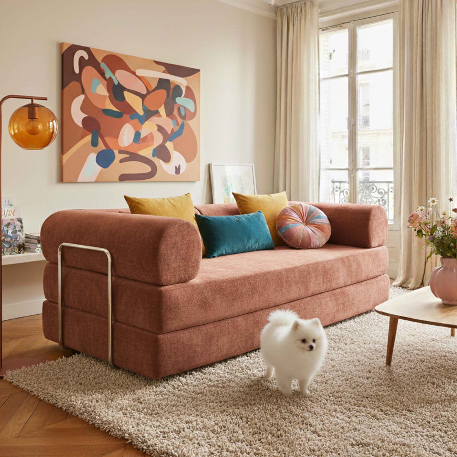 Divano letto 2 posti in tessuto con cuscini