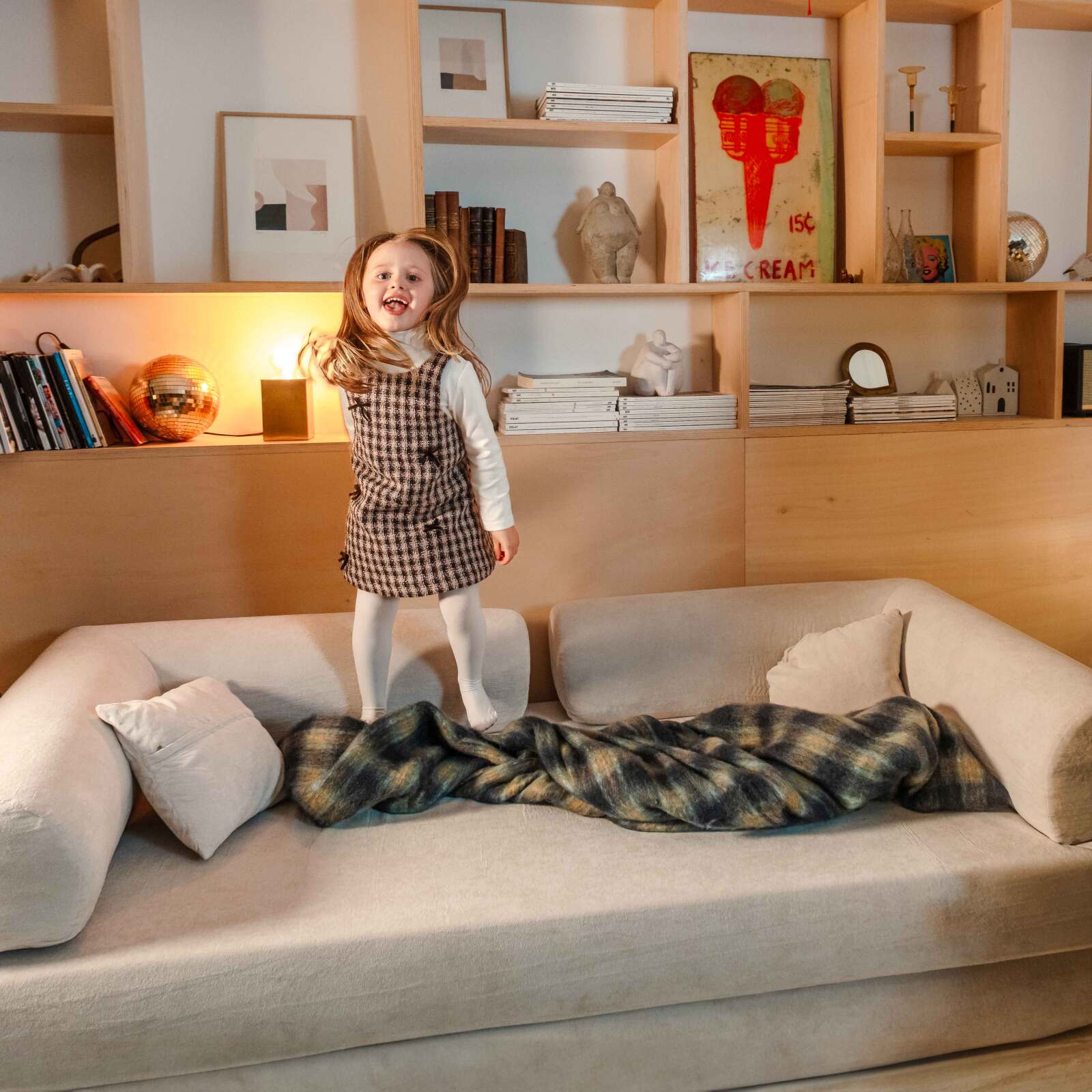 Divano letto 2 posti in tessuto con cuscini