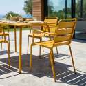 Tavolo da giardino in metallo 120x70 cm e 4 sedie con braccioli