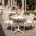 Tavolo da giardino bistrot rotonda inclinabile in metallo con piede incassato 70x70 cm e 2 sedie con braccioli
