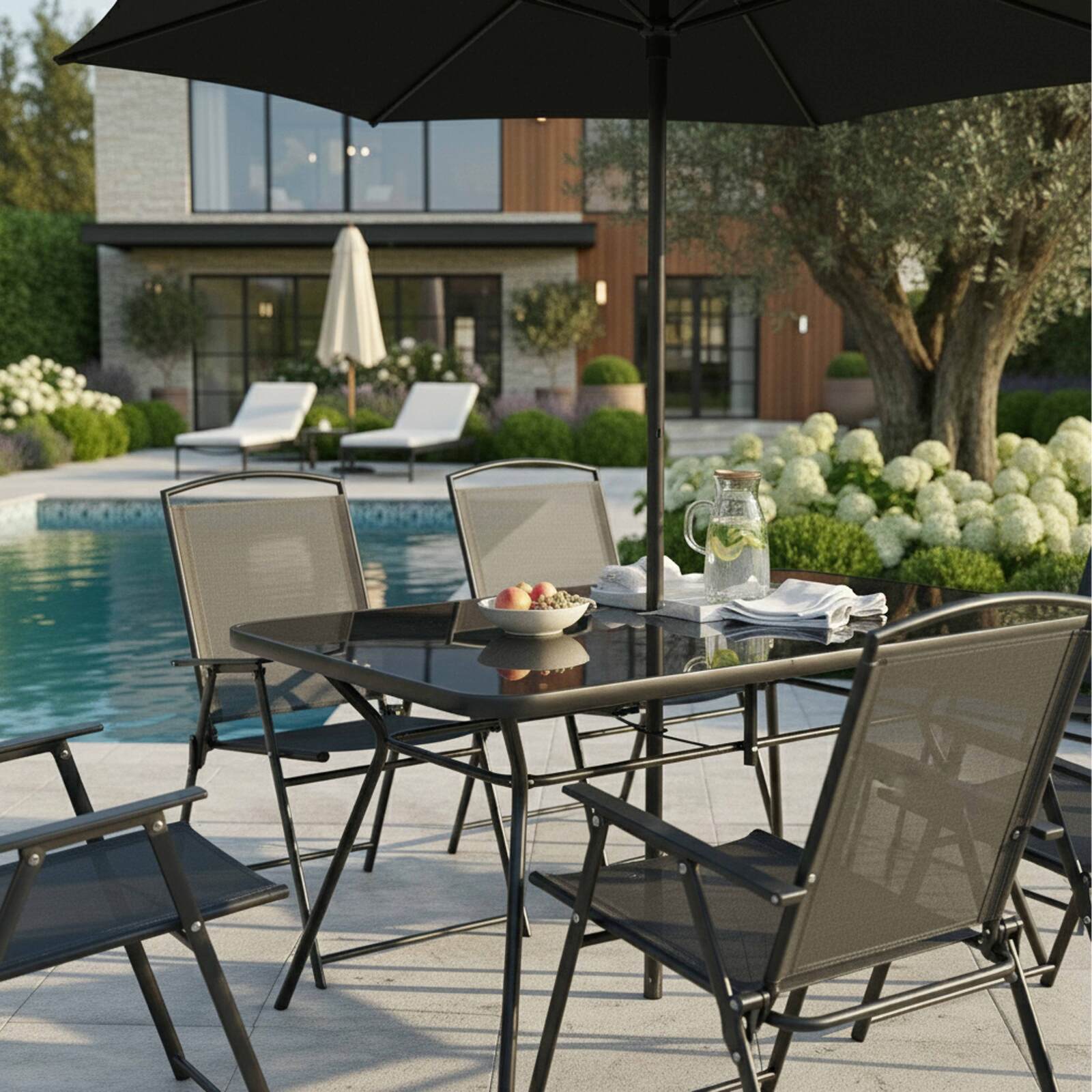 Tavolo da giardino in metallo e vetro 140x80 cm e 6 sedie con braccioli e un ombrellone