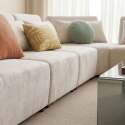 Divano angolare modulare 7 posti in tessuto con cuscini